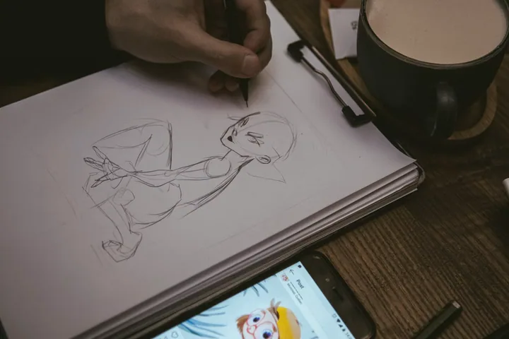 Artist realizând un portret — fotografie ilustrativă